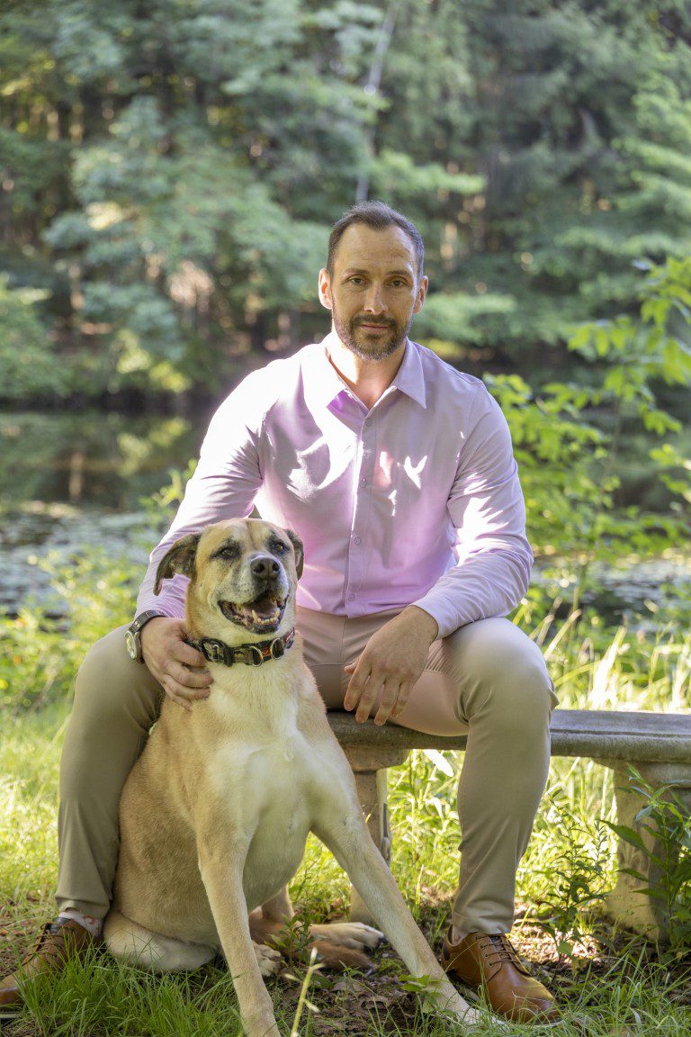 Michael Bugary and his dog Lingo sitting together